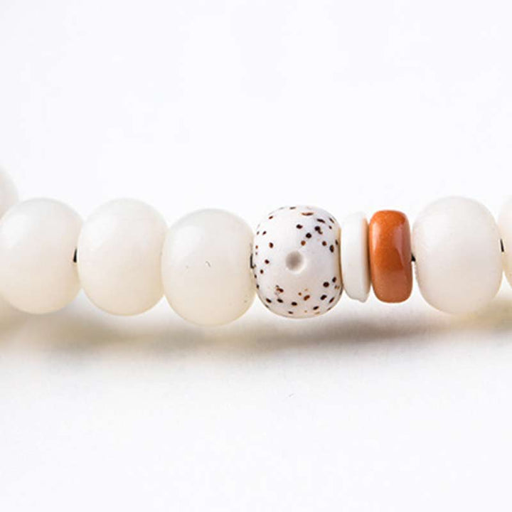 Armband weiße Jade Bodhi Lotus Segen Perlen Naturstein elastisch