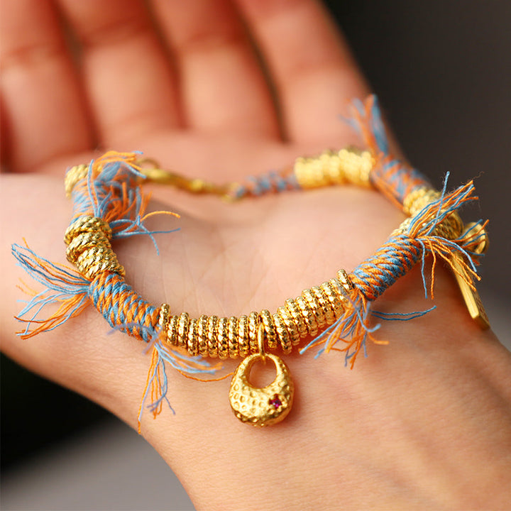 Armband Tibet Glücklich Glück Bunt Gold Blau Orange Seidenfäden Anhänger