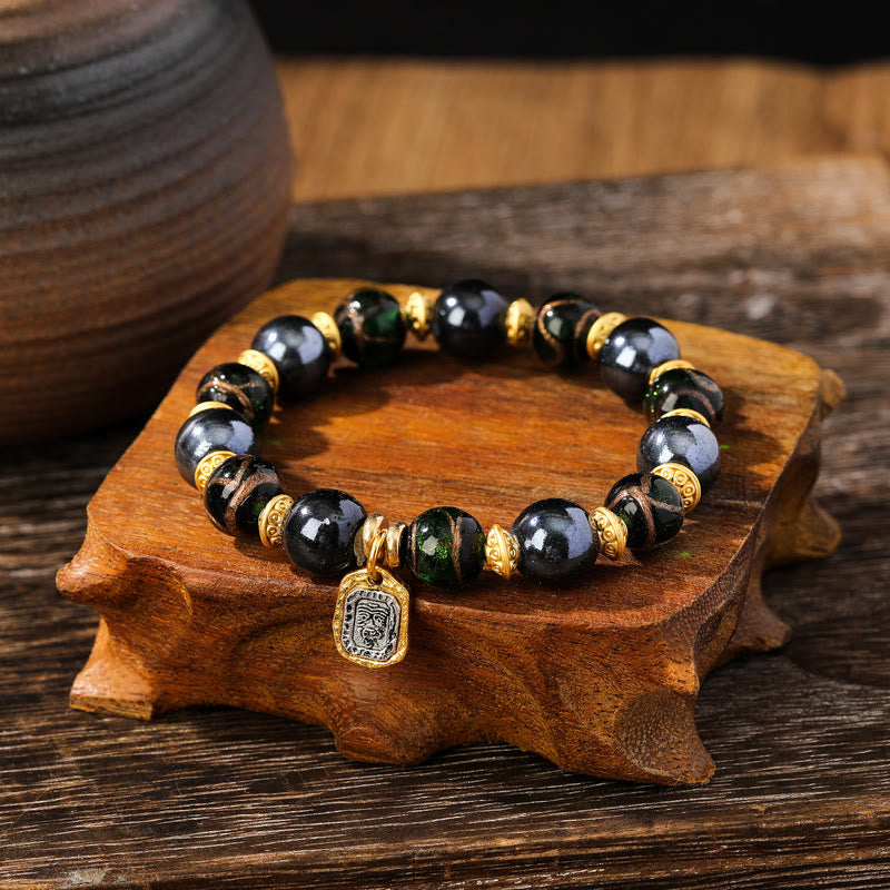 Schwarzes Obsidian Armband mit goldenen Perlen und Anhänger Schmuck
