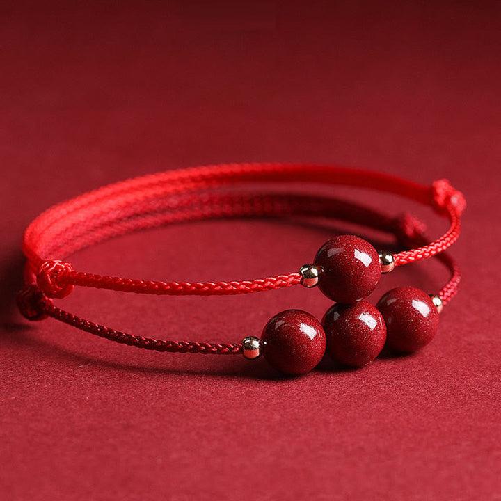 Rotes Armband Zinnober – Glück & Segen mit Perlen Flachaufnahme