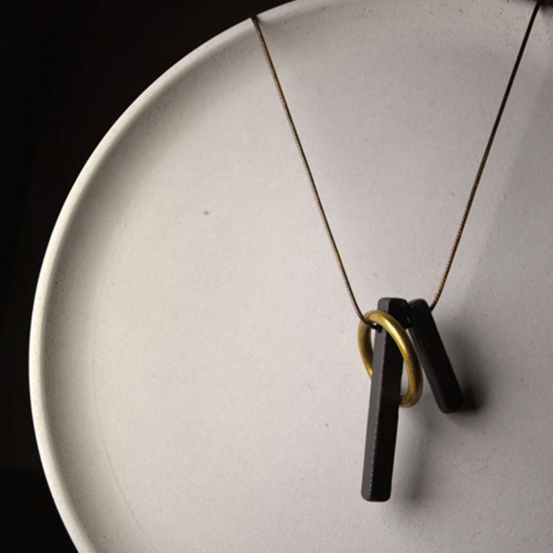 Anhänger Ebenholz Zen Kreis minimalistisch elegant schwarzgold