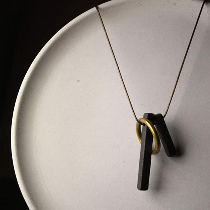 Anhänger Ebenholz Zen Kreis minimalistisch elegant schwarzgold