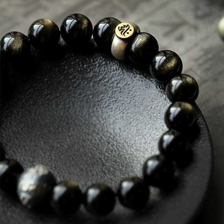 Armband Obsidian Chinesisches Tierkreis schwarze Perlen Handgelenk getragen