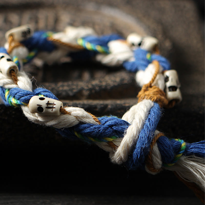 Armband – Glück & Wohlstand & Harmonie mit weißen Perlen blau gewebtem Seil