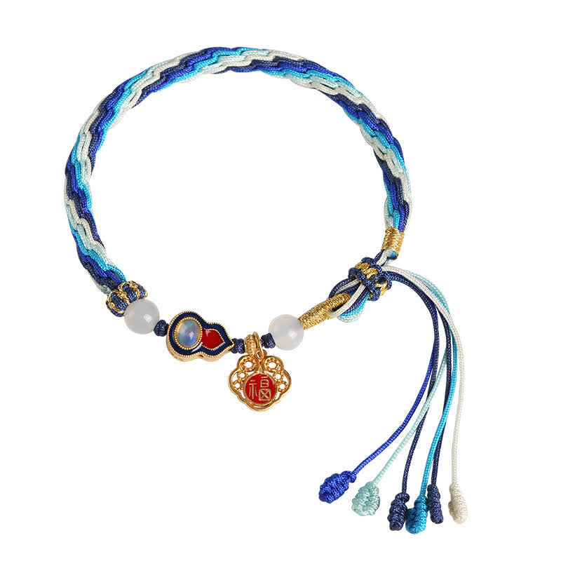 Blaues Seiden-Armband 925 Silber mit Glücksanhänger und Perlen.