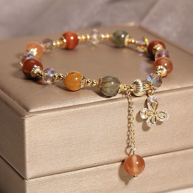 Armband Kristall Schmetterling Wohlstand mit Edelsteinen und Schmetterlingscharm.