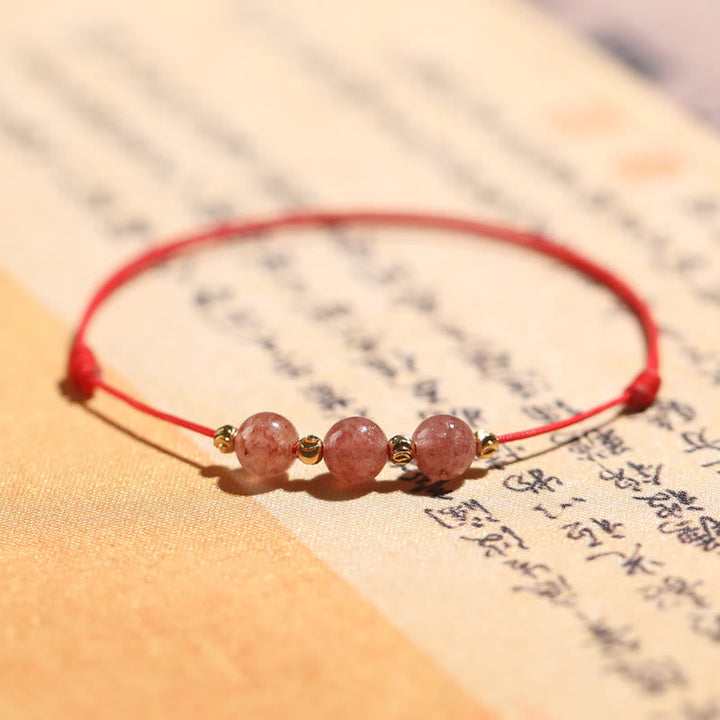 Armband Erdbeerquarz Kristall – Liebe mit roten Perlen elegant