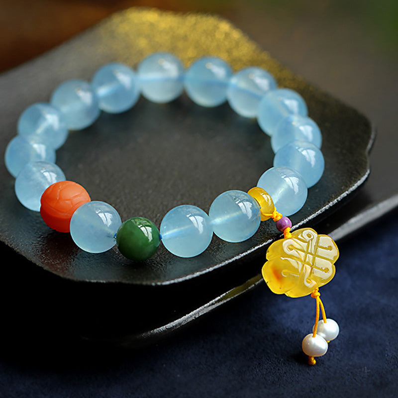 Armband Aquamarin – Frieden mit roten und grünen Achat Perlen Anhänger