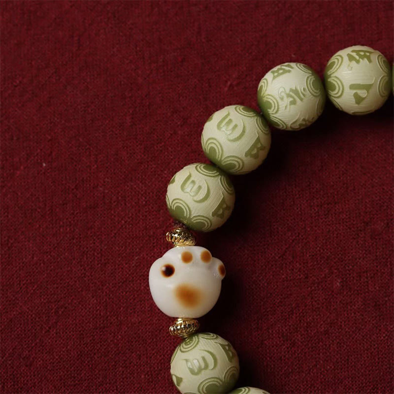 Bodhi Om Mani Padme Hum Armband mit grünen und weißen Perlen elegante Schnur.