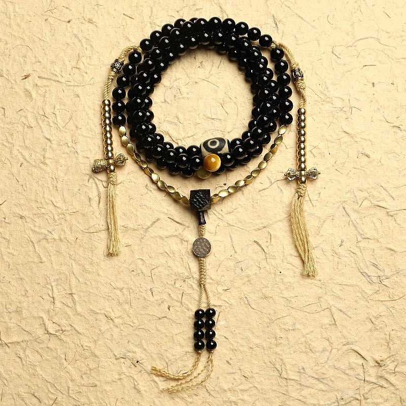 Mala Schwarzer Onyx – Schutz Perlenarmband mit goldenem Quaste Anhänger