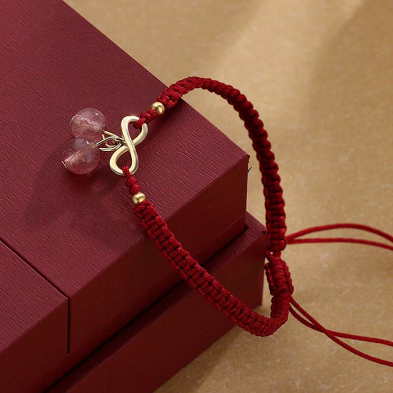 Rotes Armband mit Erdbeerquarz Kristall und Unendlichkeits-Charm elegantes Design.