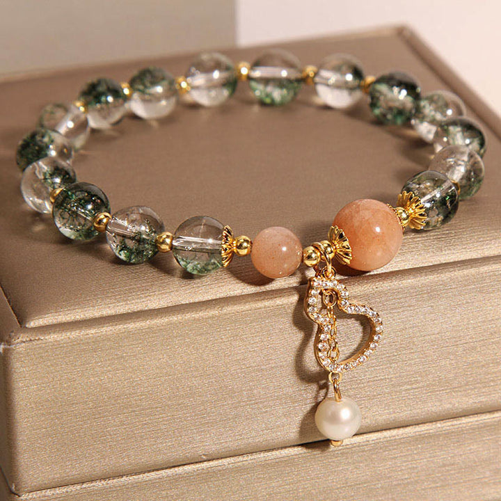 Armband Grün Phantom Gourd mit Pfirsich Stein und Perlen Anhänger.