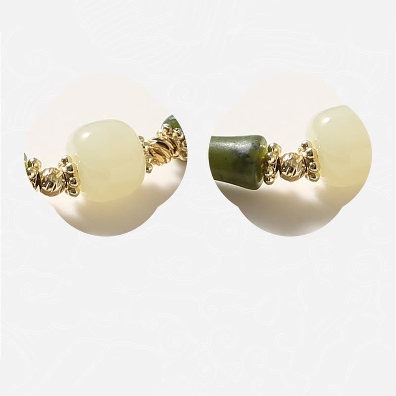 Armband Bambus Glück Stärke mit Perlen und goldenen Akzenten elegant.
