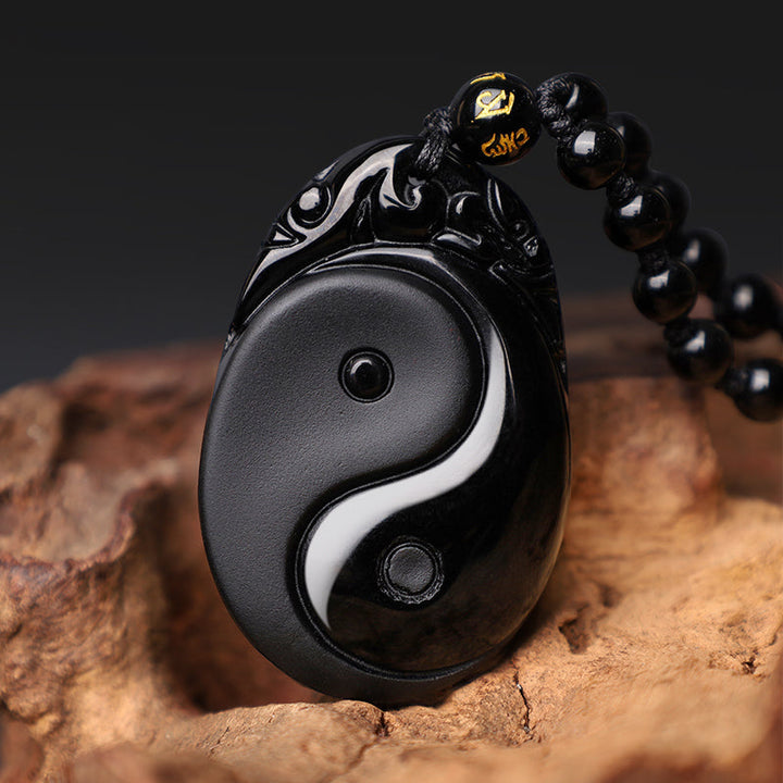 Anhänger Obsidian Yin Yang schwarzer Naturstein Erfüllung Kraft Perlen