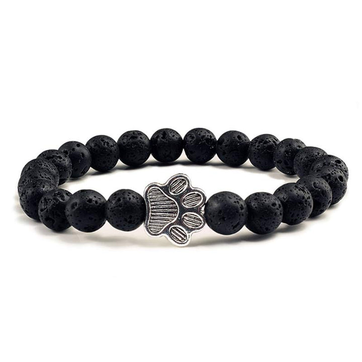 Schwarzes Lava-Stein Armband Hund Charm Naturstein elastisch.