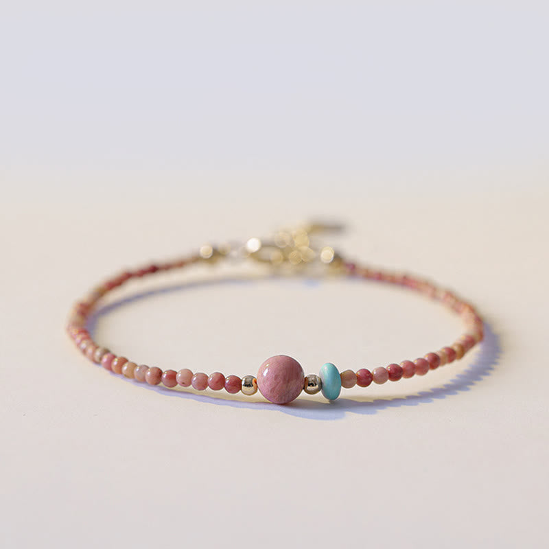 Armband – Energie mit rosa Edelsteinen und türkisem Achat Perle