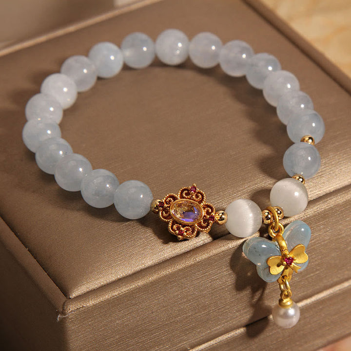 Aquamarin Perlen Armband mit goldenen Schmetterling und Perle Charme