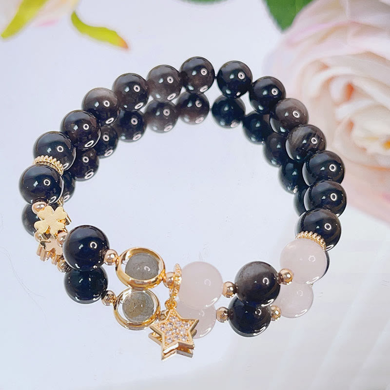 Schwarzes Obsidian Armband Silber Stern Schutz elegant getragen