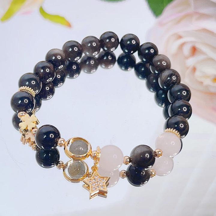 Schwarzes Obsidian Armband Silber Stern Schutz elegant getragen