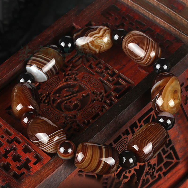 Armband Onyx – Glück & Mut mit braunen Achatsteinen und schwarzen Perlen
