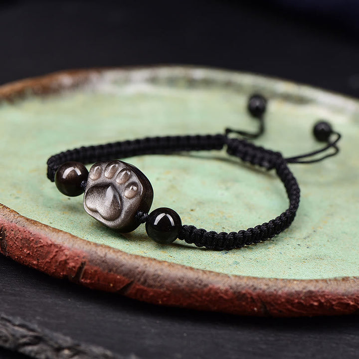 Silbernes Katzenpfoten Armband mit schwarzen Obsidian Perlen elastisch.