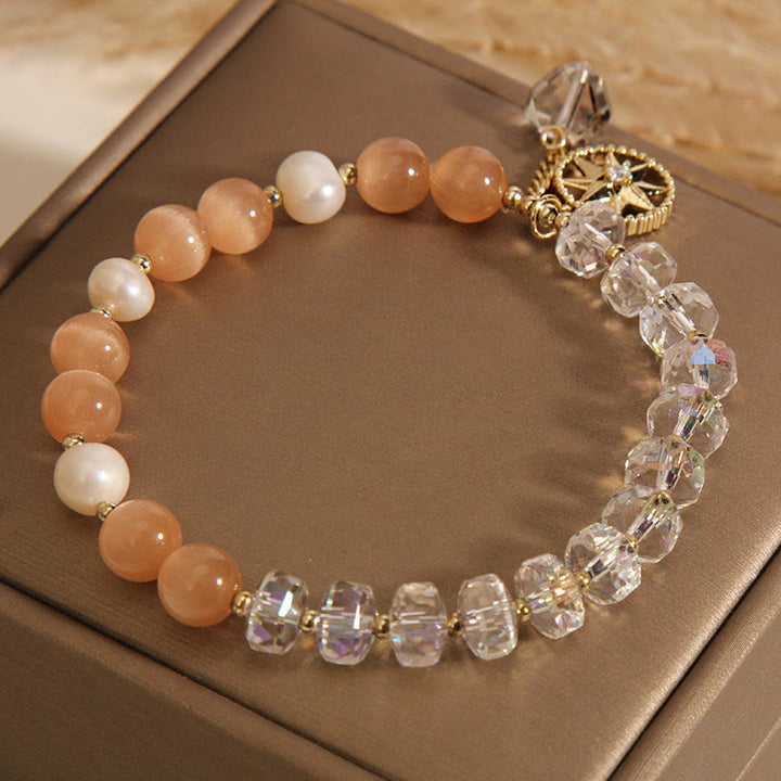 Armband Weißer Kristall Stern mit Pfirsichquarz und Perlen elegant.