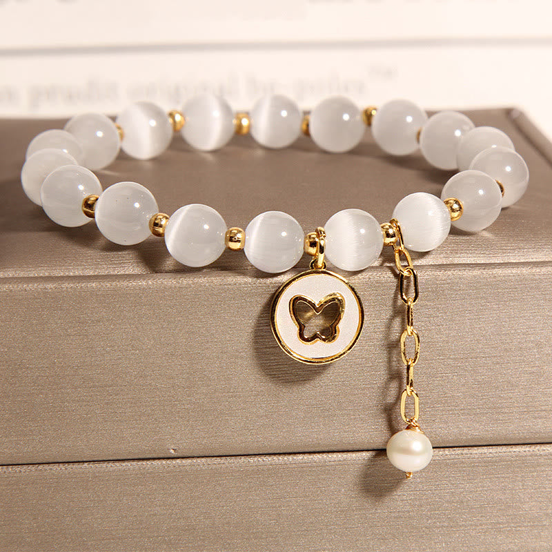 Armband Schmetterling – Liebe Energie weiße Perlen Gold charm
