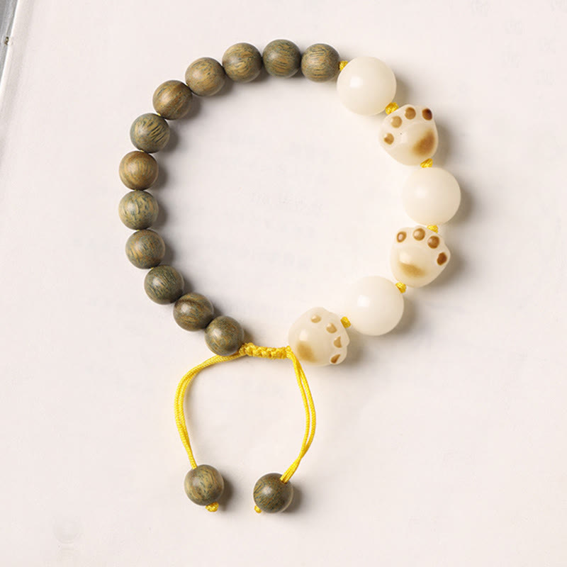 Armband Sandelholz Bodhi Katze elfenbein golden elastisch Perlen