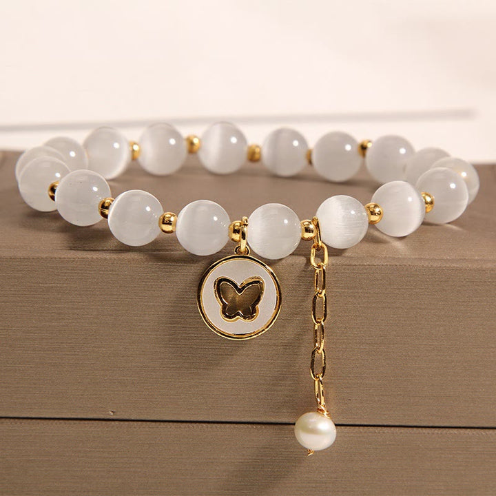 Armband Schmetterling – Liebe Energie weißer Mondstein gold elegant Charm