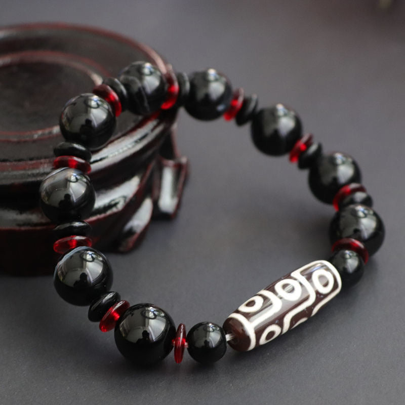 Armband Schwarzer Onyx – Schutz & Wohlstand mit roten Kristallen Nahaufnahme