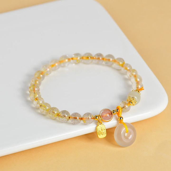 Armband Fu-Zeichen Wohlstand Frieden Citrin Edelstein golden elegant.