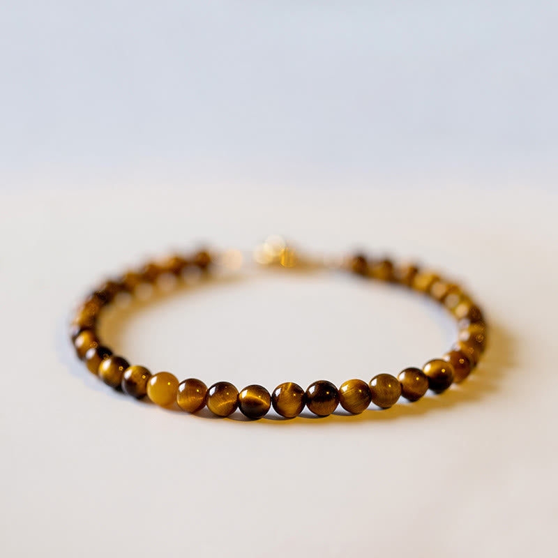Armband Tigerauge – Schutz & Mut braune Perlen Nahaufnahme Flatlay