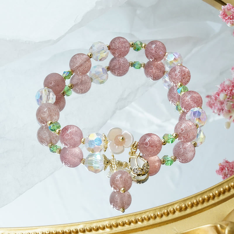 Armband Erdbeerquarz Fluorit Heilung rosé Perlen elegant geschmückt