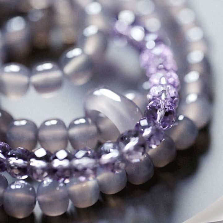 Amethyst Kristall Armband Heilung Stärke lila Naturstein elastisch getragen