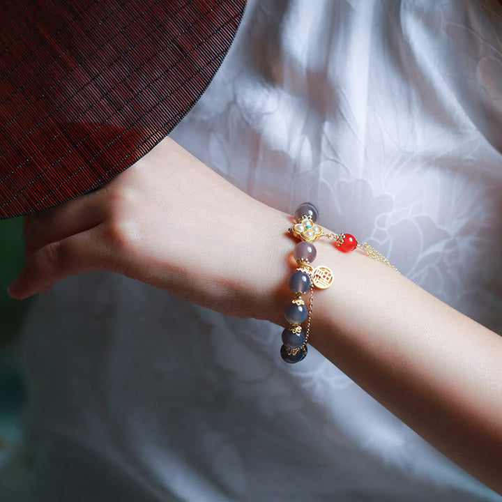 Armband Achat Perle Fu-Zeichen Balance am Handgelenk getragen