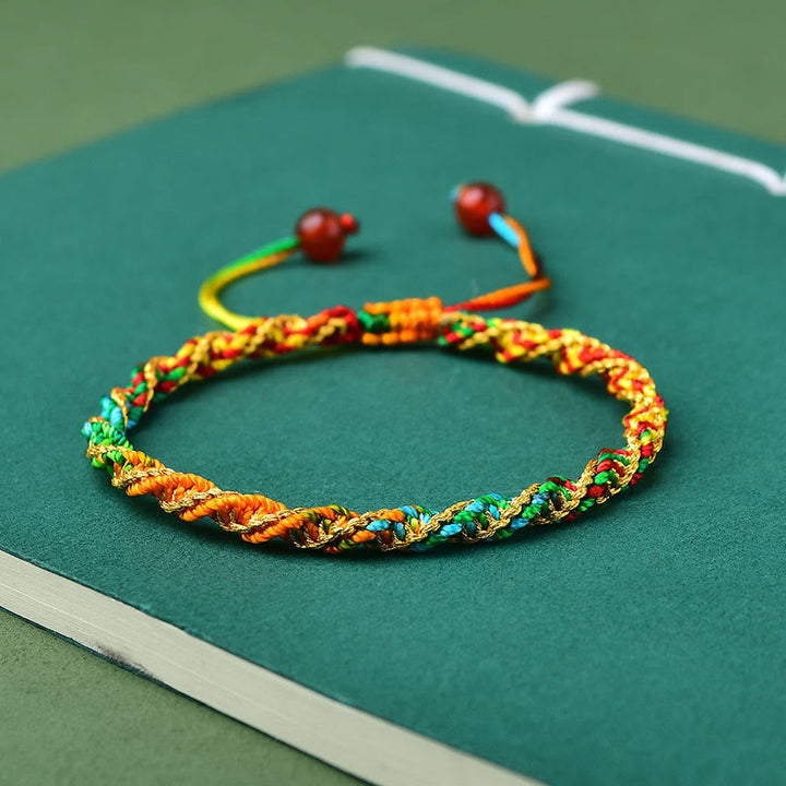 Buntes Glück Armband mit roten Perlen Zongzi Design elastisch.