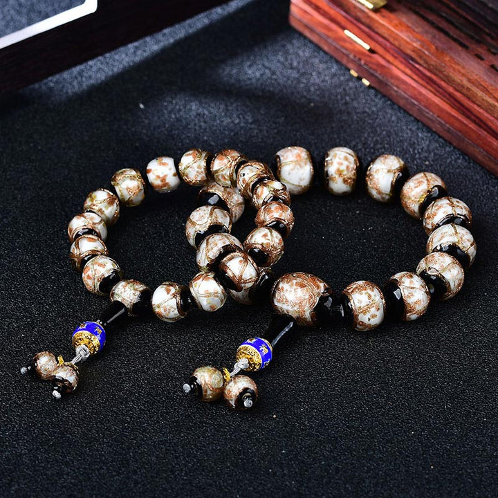Armband Achat Drachen mit braunen Perlen und blauen Akzenten elastisch