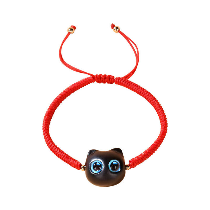 Rotes Armband Ebenholz Katze mit blauen Augen elastisch.