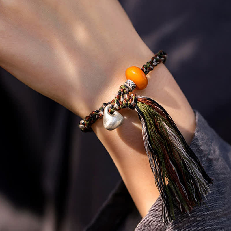 Armband 925 Silber – Schutz mit orangem Stein und grüner Quaste