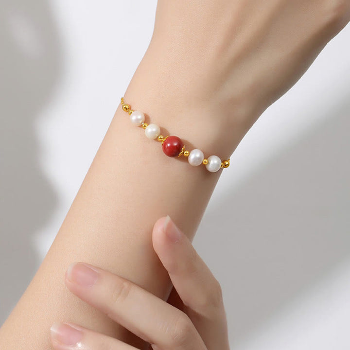 Armband 925 Silber Zinnober Heilung mit weißen Perlen elastisch tragbar