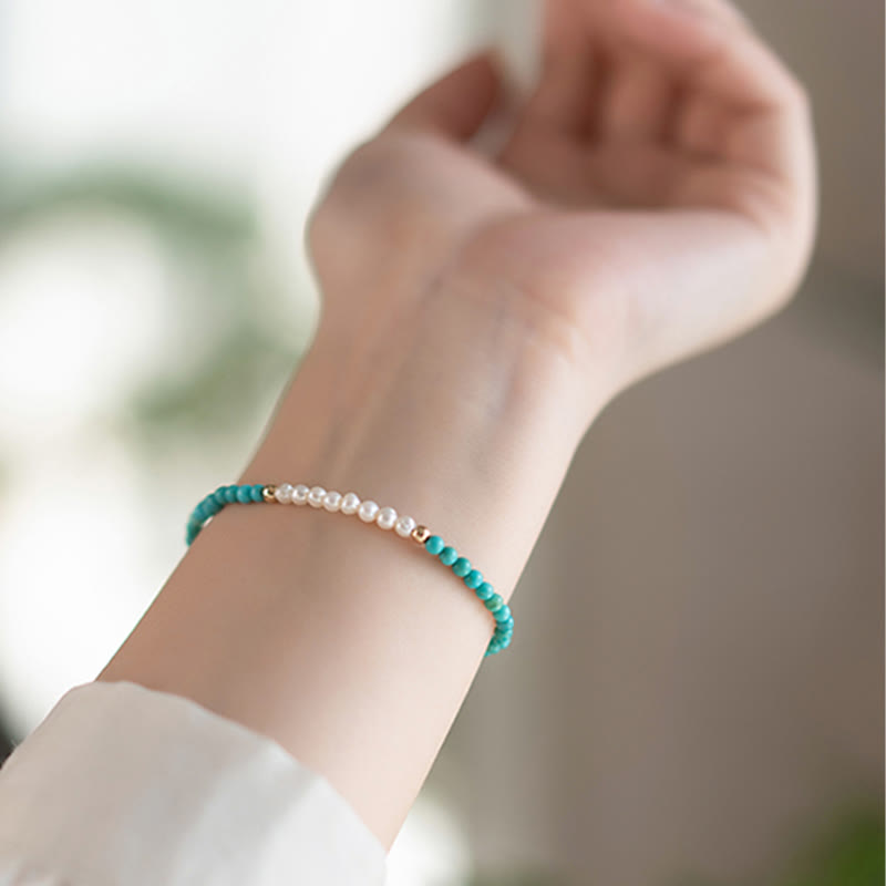 Armband 925 Silber Türkis Perlen elastisch am Handgelenk getragen