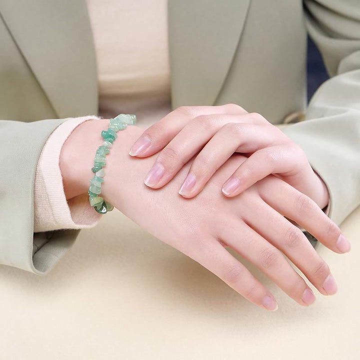 Armband Kristall Wärme grüner Stein elastisch Handgelenk getragen elegant