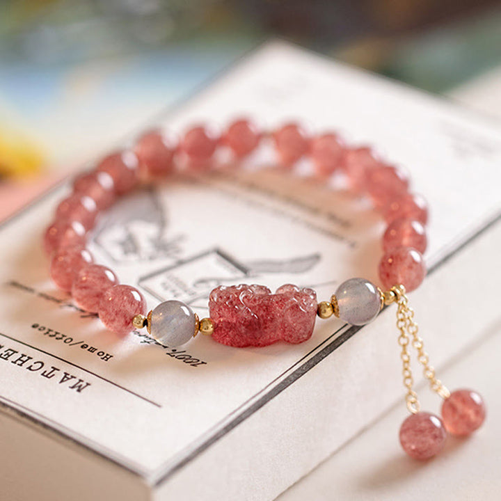 Armband Erdbeerquarz Mondstein Pixiu elastisch Naturstein Rosa Heilung Liebe