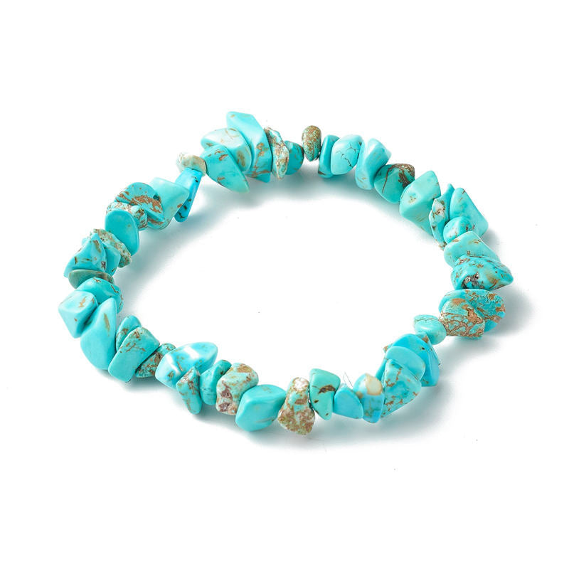 Türkis Chip Armband elastisch Naturstein blau grün schimmernd Handgelenk.
