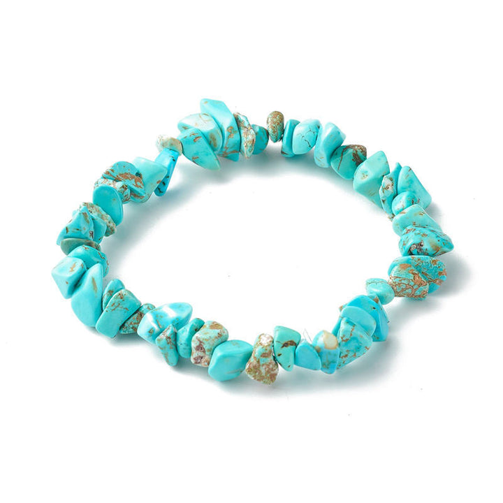 Türkis Chip Armband elastisch Naturstein blau grün schimmernd Handgelenk.