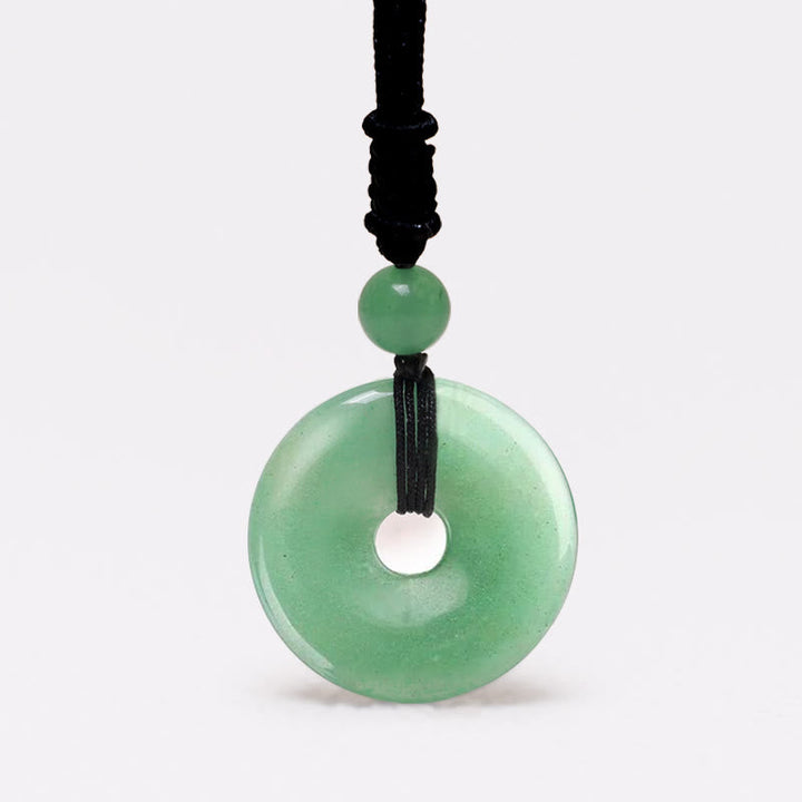 Grüne Jade Münze Anhänger Kette schwarzes Band Naturstein Schmuck