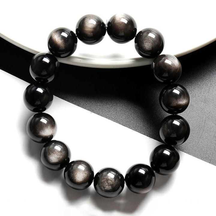 Armband Silber Obsidian – Schutz schwarze Perlen glänzend Naturstein elastisch