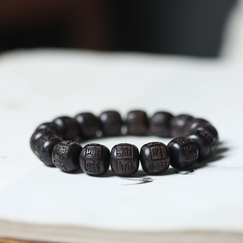Schwarzes Ebenholz Armband mit Om Mani Padme Hum Gravur Perlen
