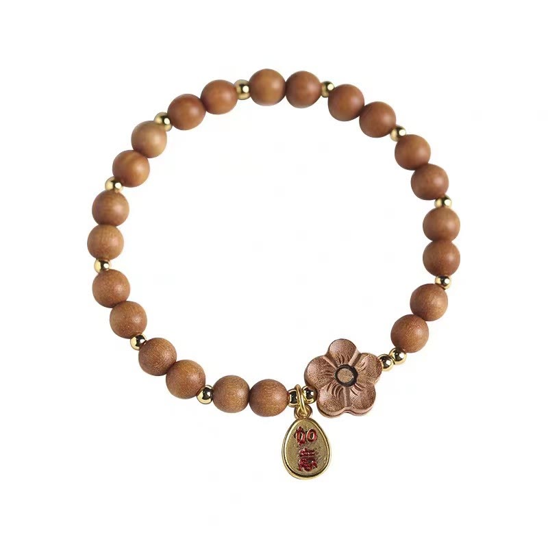 Armband Sandelholz Pfirsichblüte – Schutz mit Tropfenanhänger elegant.