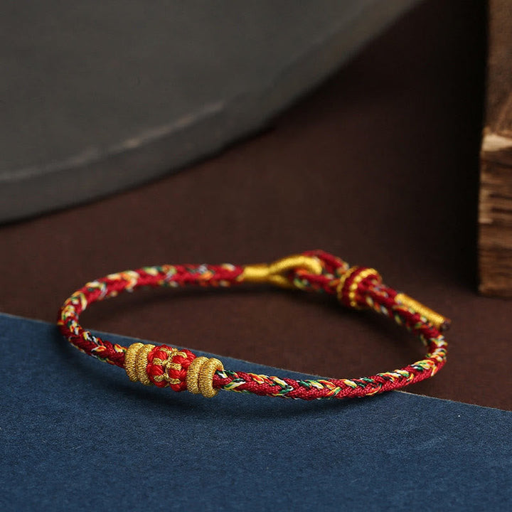 Armband Bunt Geflochten Knoten – Glück mit goldenen Perlen rot